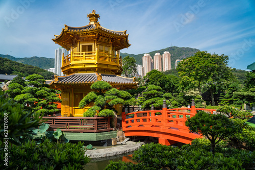 Beautiful gold pagoda in a busy urban city. Hong Kong