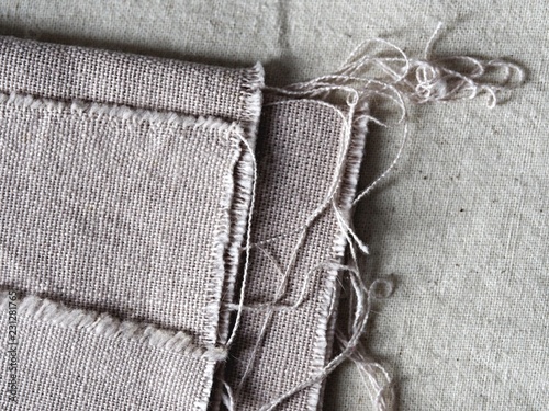 Φωτογραφία close up of linen fabric, unravel
