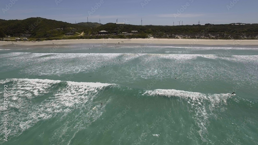 Aerial view of Cape Bridgewater, Victoria, Australia with surfers having fun.
