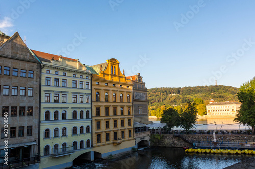 Historic buildings overlooking a river