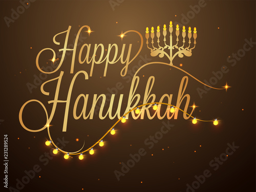 Happy Hanukkah lettering decorated with lighting garland on glossy brown background for Jewish Holiday celebration.