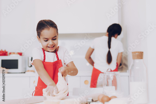 Girl in Kitchen Preparation Sweet Biscuit and Pie.