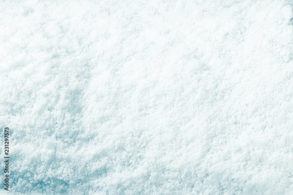 Snow background. Surface of pure snow texture.