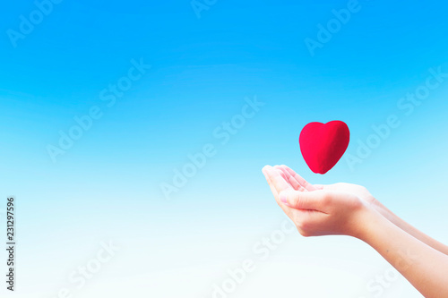 Love and Valentine's Day concept：People open hands holding heart shape