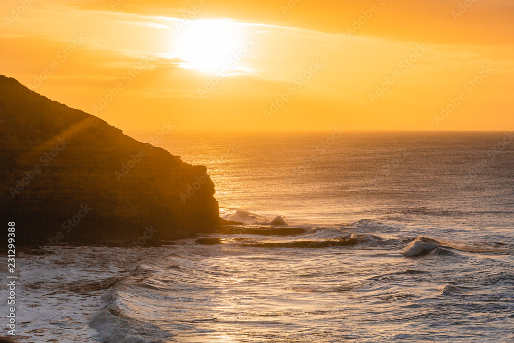 Sunrise Waves and Coastline