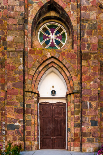 entrance group in catholic gothic ancient stone temple