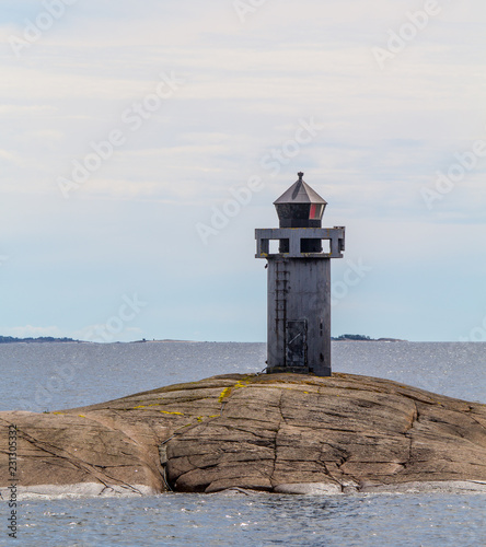 lighthouse on coast of sea