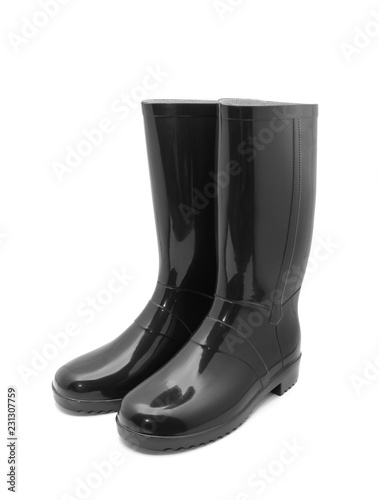 Black rubber boots on a white background