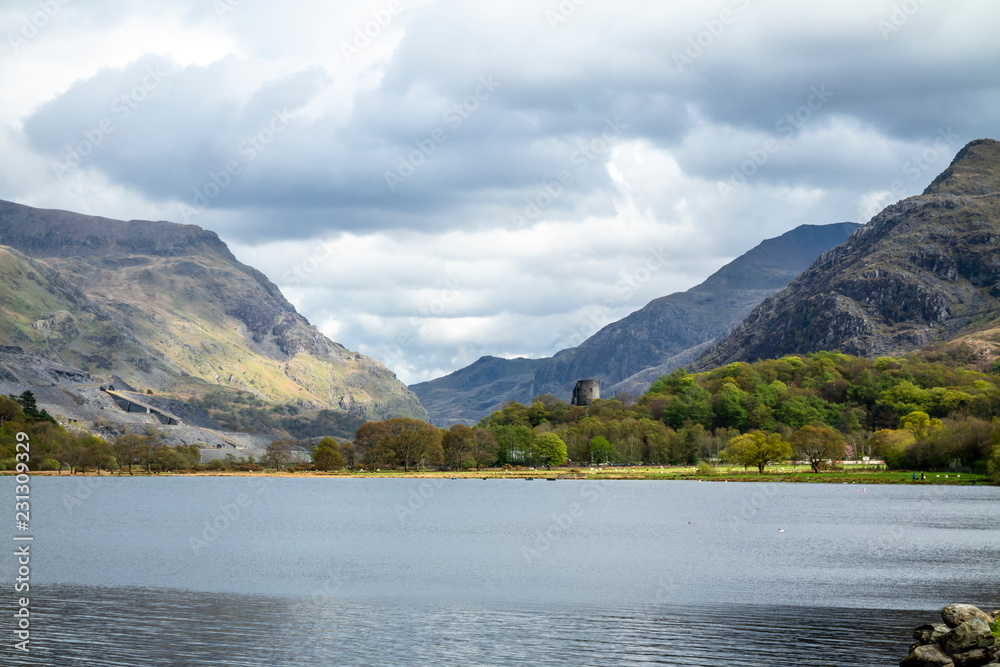 Reflections at Llyn Padarn with Dolbadarn Castle at Llanberis in Snowdonia National Park in background - Wales Reflections at Llyn Padarn with Dolbadarn Castle at Llanberis in Snowdonia National Park in background - Wales