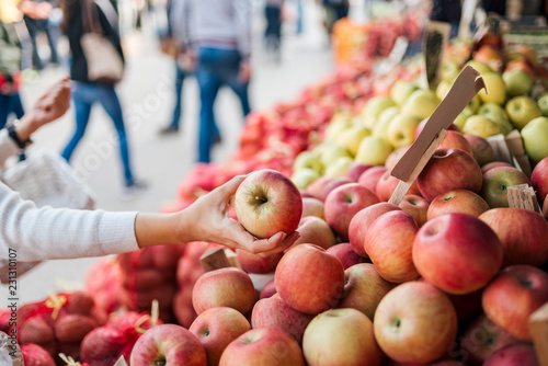 Buying fresh apples. photo