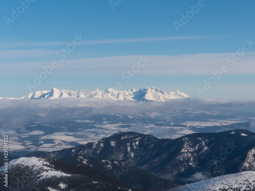 Snowy winter peaks in High Tatras from hill Chopok in Low Tatras mountains  Slovakia