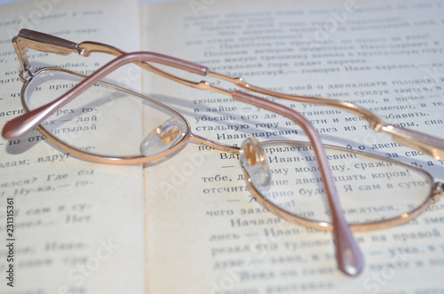 glasses on book of fairy tales
