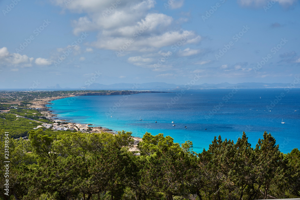Beach of Formentera with turquoise sea Mediterranean of Balearic islands