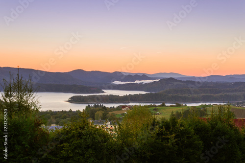 Bieszczady Mountains in Poland. View of Lake Solina from Polanczyk at dawn.
