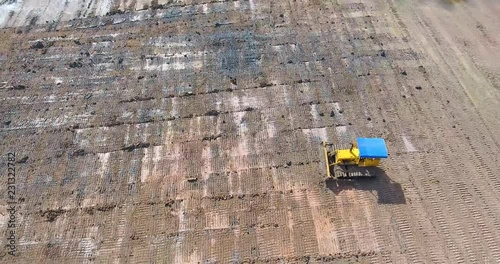 Aerial view of bulldozer on muddy 6