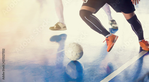 Indoor soccer sports hall. Football futsal player