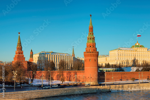 Moscow Kremlin in winter with ice river. Kremlin Wall, towers and Grand Kremlin Palace. Moscow Russia.