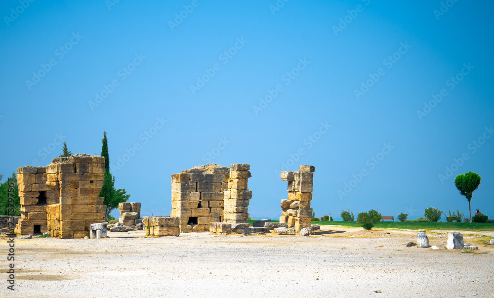 Old ancient stones, ruined walls and buildings, Pamukkale, Turkey