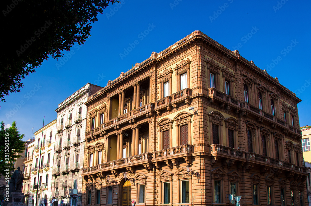 Typical street and buildings in old style, Catania, Sicily, Italy
