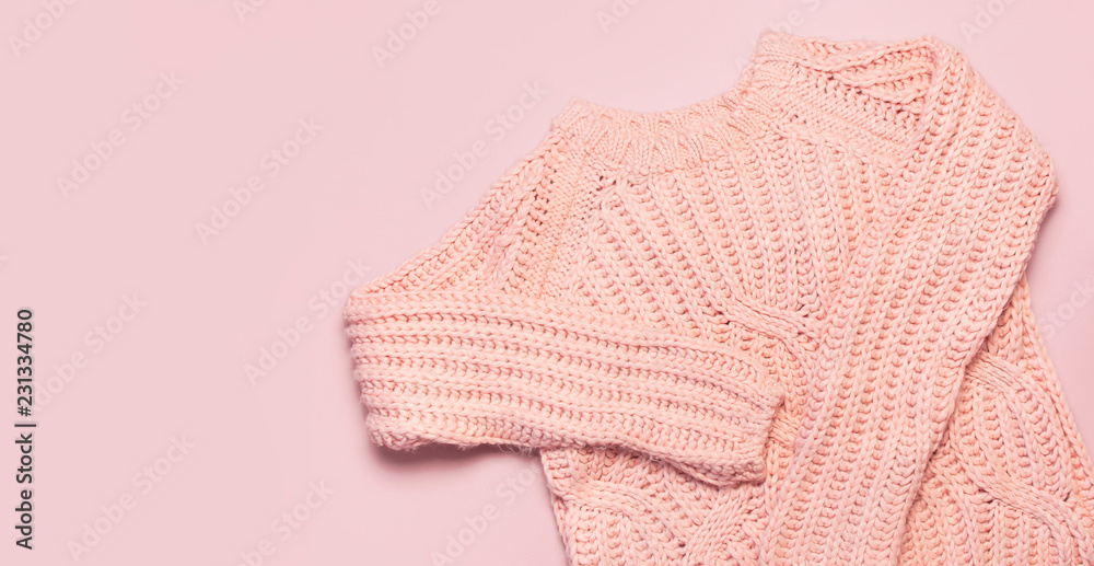 Female pink knitted sweater pullover on 