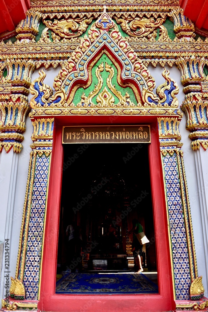 Door into temple in Bangkok, Thailand. 