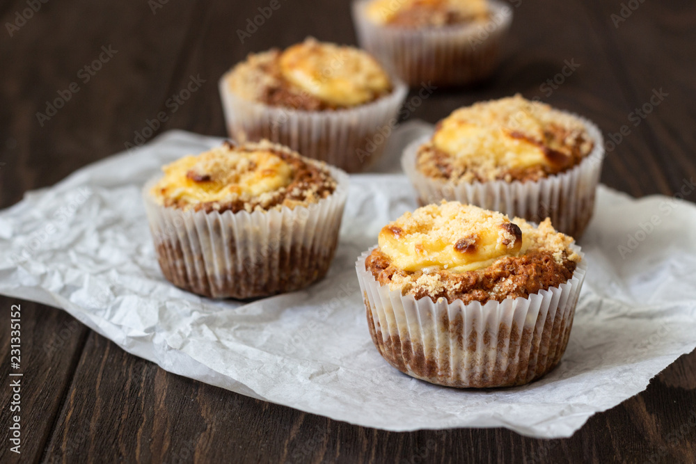 Fresh homemade muffins with cream cheese filling and streusel. Fresh homemade muffins with cream cheese filling and streusel.