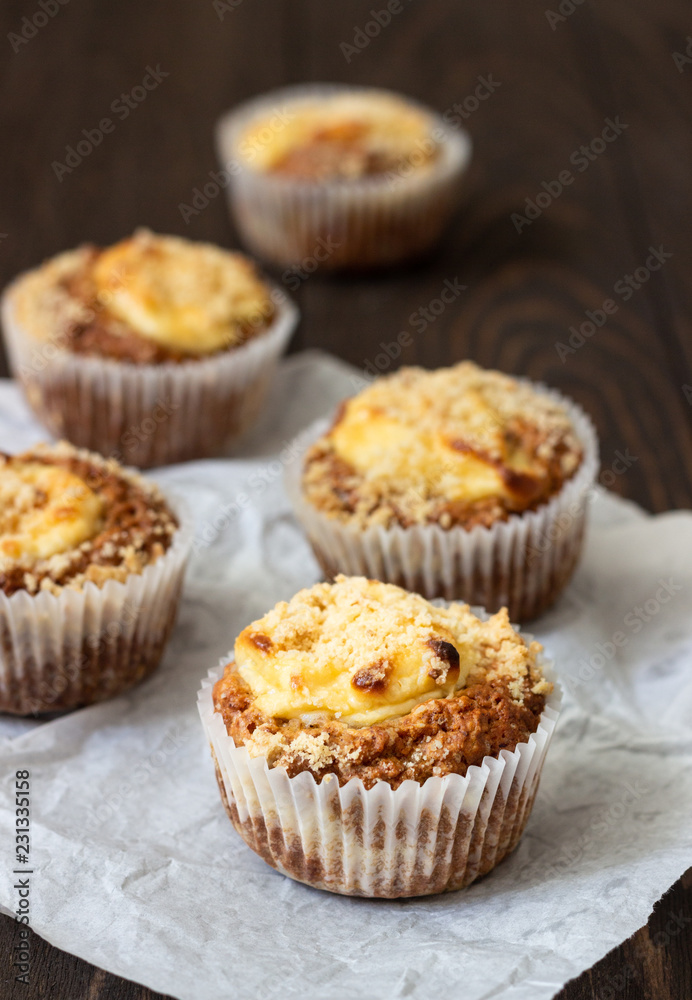 Fresh homemade muffins with cream cheese filling and streusel. Fresh homemade muffins with cream cheese filling and streusel.