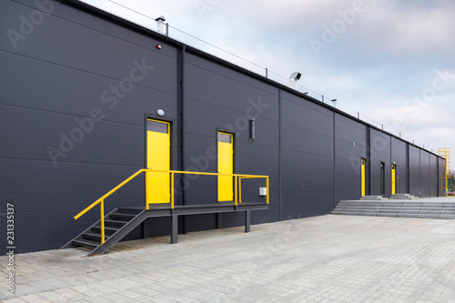 Back door at large warehouse outside view