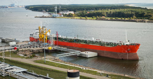 The oil tanker is moored at the petroleum product terminal in the port of Klaipeda.