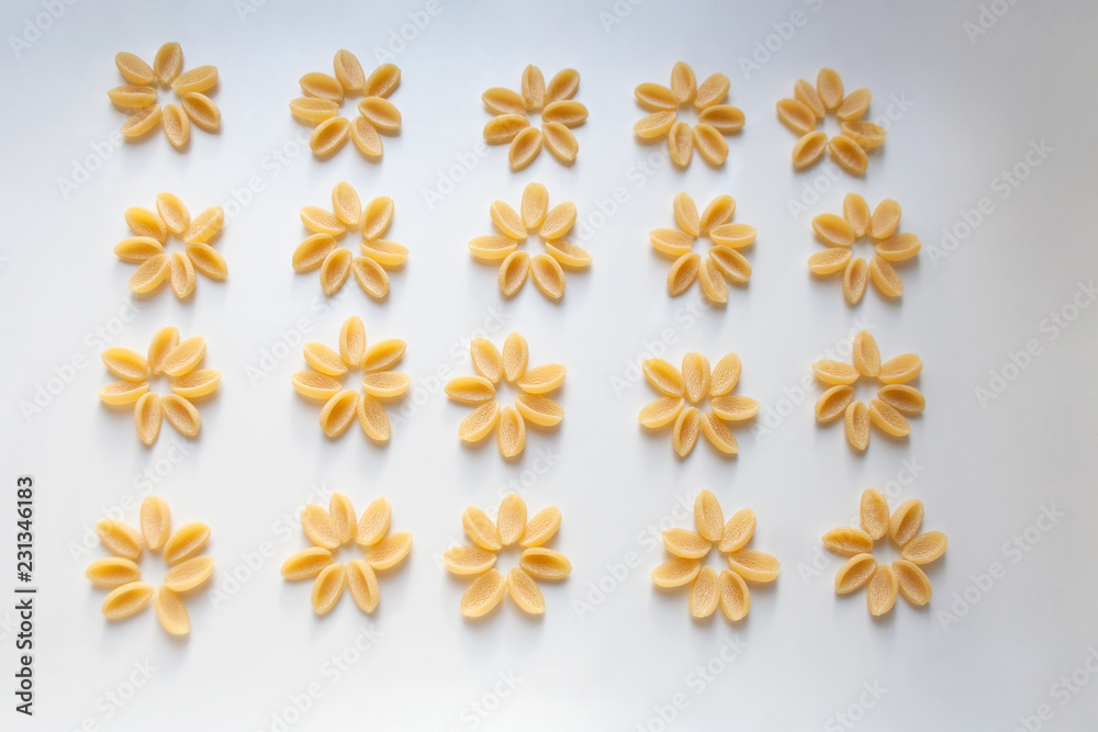 Gnocchetti pasta floral pattern abstract background Gnocchetti pasta floral pattern abstract background