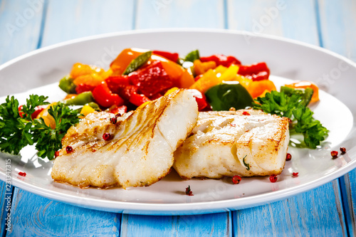 Photography Fish dish - fried fish fillet and vegetables