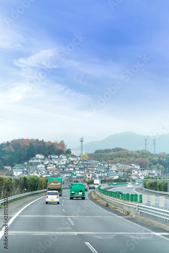 autumn colorful of Japan, maple leaves change color tree on the express highway road, road to yamanashi, japan