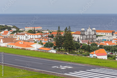 View of Santa Cruz Das Flores city and airport Flores Island and Corvo island in the background, Azores photo