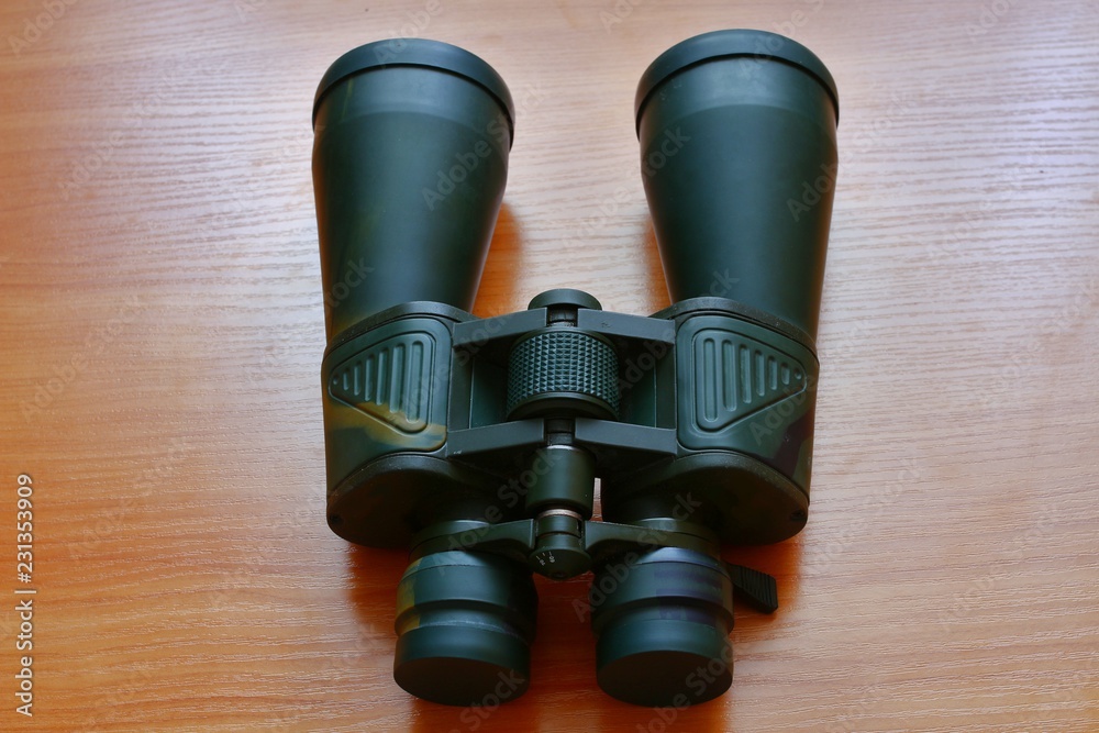 Binoculars on the table Binoculars on the table
