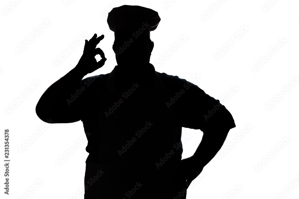 silhouette of a happy chef on a white isolated background, male hand shows ok