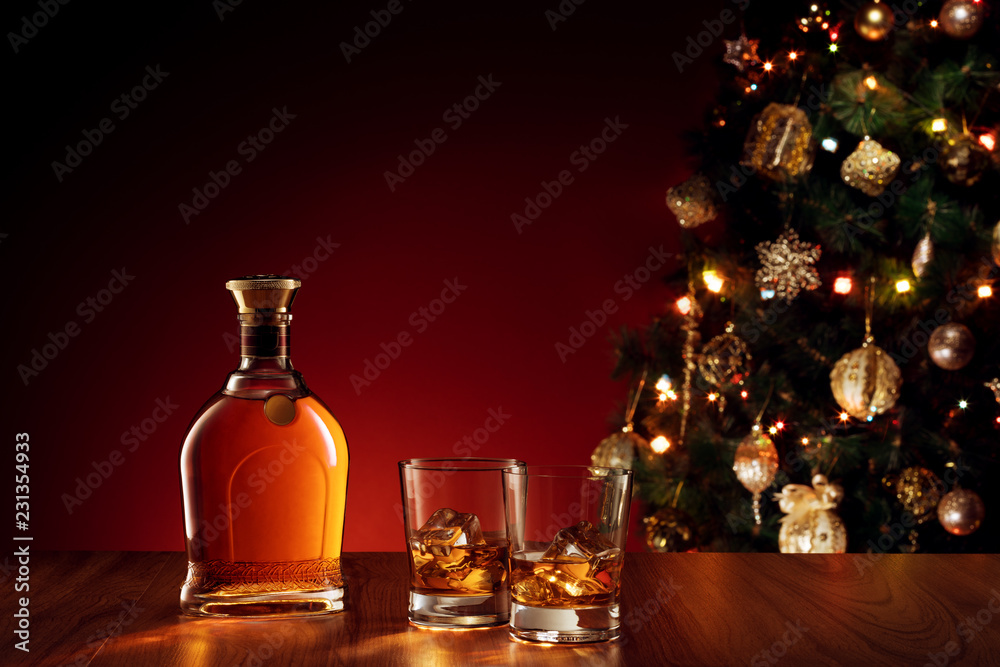 close up view  of glass with whiskey on color back