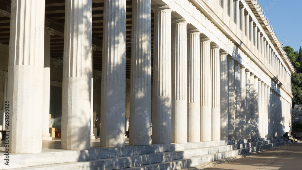 Collonade with shadows in Athens, Greece