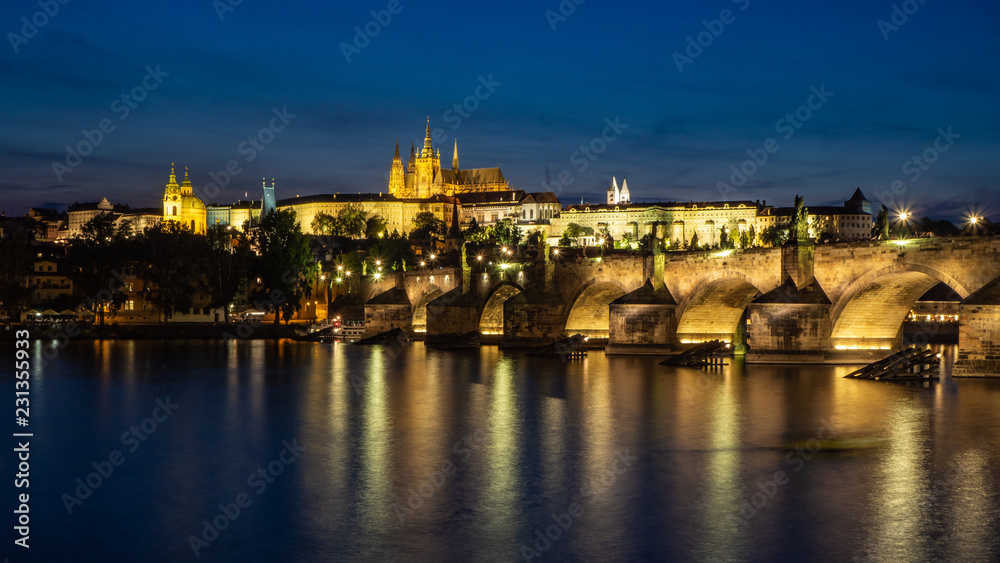 Prague castle with Charles bridge in the night