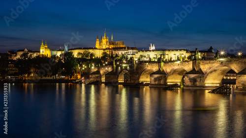 Prague castle with Charles bridge in the night