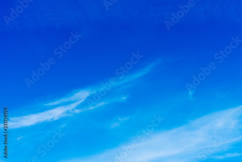 Blue sky with clouds background texture
