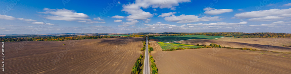 autumn aerial countryside field ukrainian lanscape with clouds and blue sky