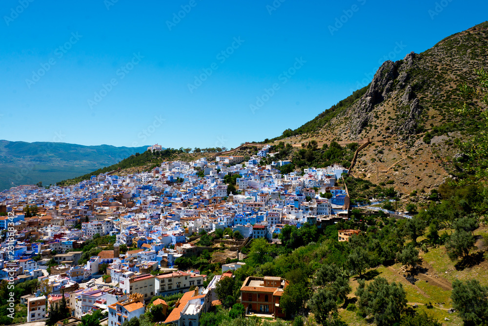 cityscape of famous blue town chefchaouen in rif mountains, morocco