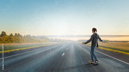 Teenager girl ride her skateboard. Mixed media © Sergey Nivens