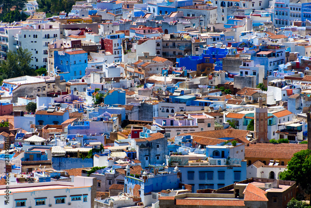 cityscape of famous blue town chefchaouen in rif mountains, morocco
