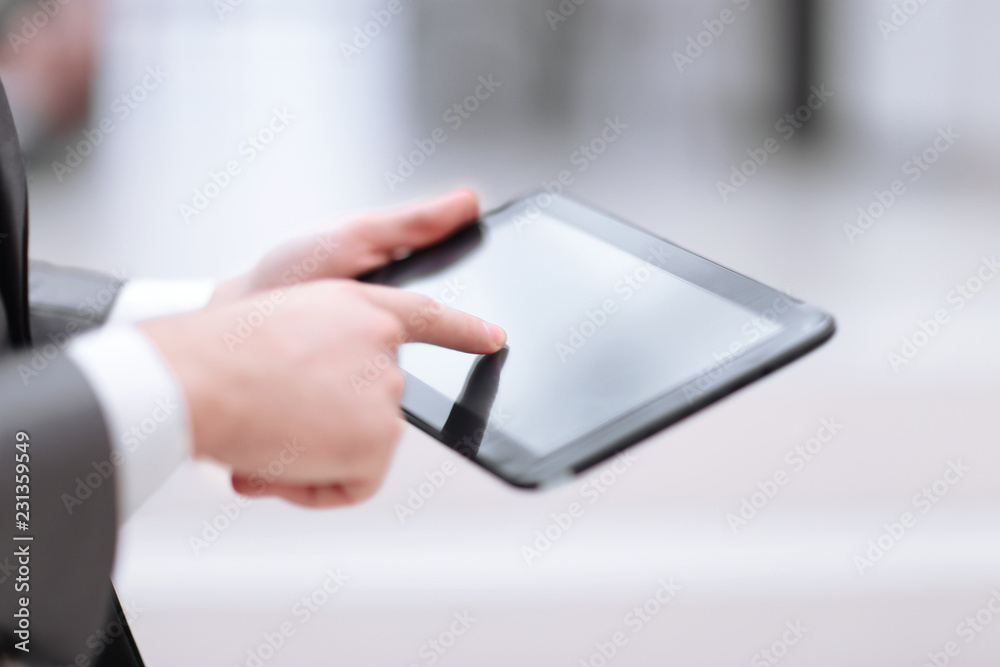 Close-up Of Businessperson Using Digital Tablet With Blank Disp Close-up Of Businessperson Using Digital Tablet With Blank Disp