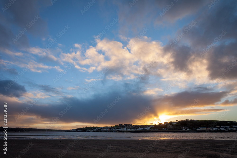 A view of appledore at sunset from Instow beach in  Devon