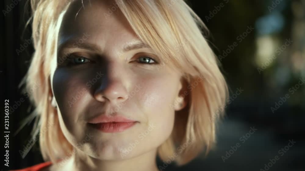 Young blond caucasian woman face portrait. Close up Young blond caucasian woman face portrait. Close up