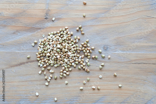 buckwheat grain on wooden background