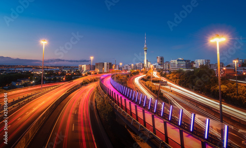 Auckland City evening Shot on the bridge with lights of buildings and traffic, New Zealand