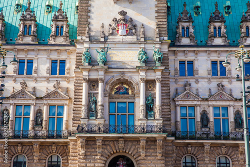 Hamburg City Hall building located in the Altstadt quarter in the city center at the Rathausmarkt square in a beautiful early spring day photo